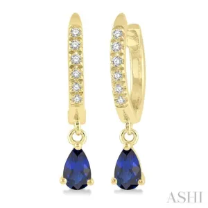 1/8 ctw Round Cut Diamond & 5x3MM Pear Cut Sapphire Petite Fashion Huggie Earrings in 10K Yellow Gold