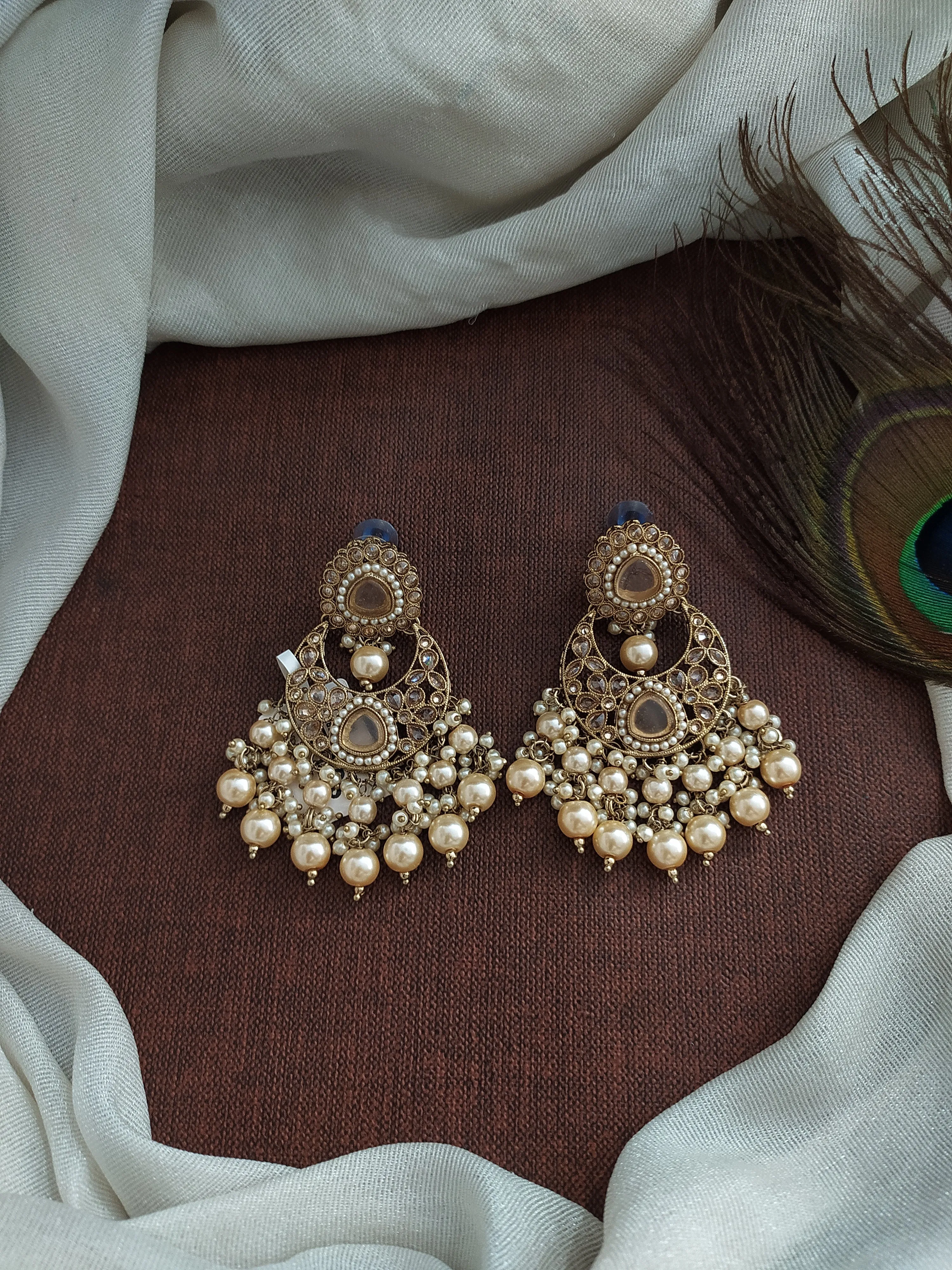 Dance with Dazzling Brilliance of Uncut Polki Stone & Pearl Mehandi Earrings