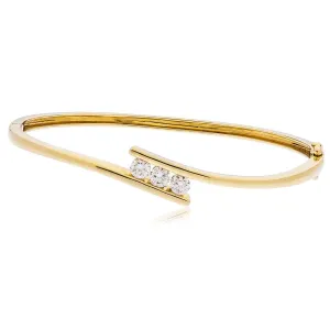 DIAMOND THREE STONE CROSS OVER BANGLE IN 18K YELLOW GOLD