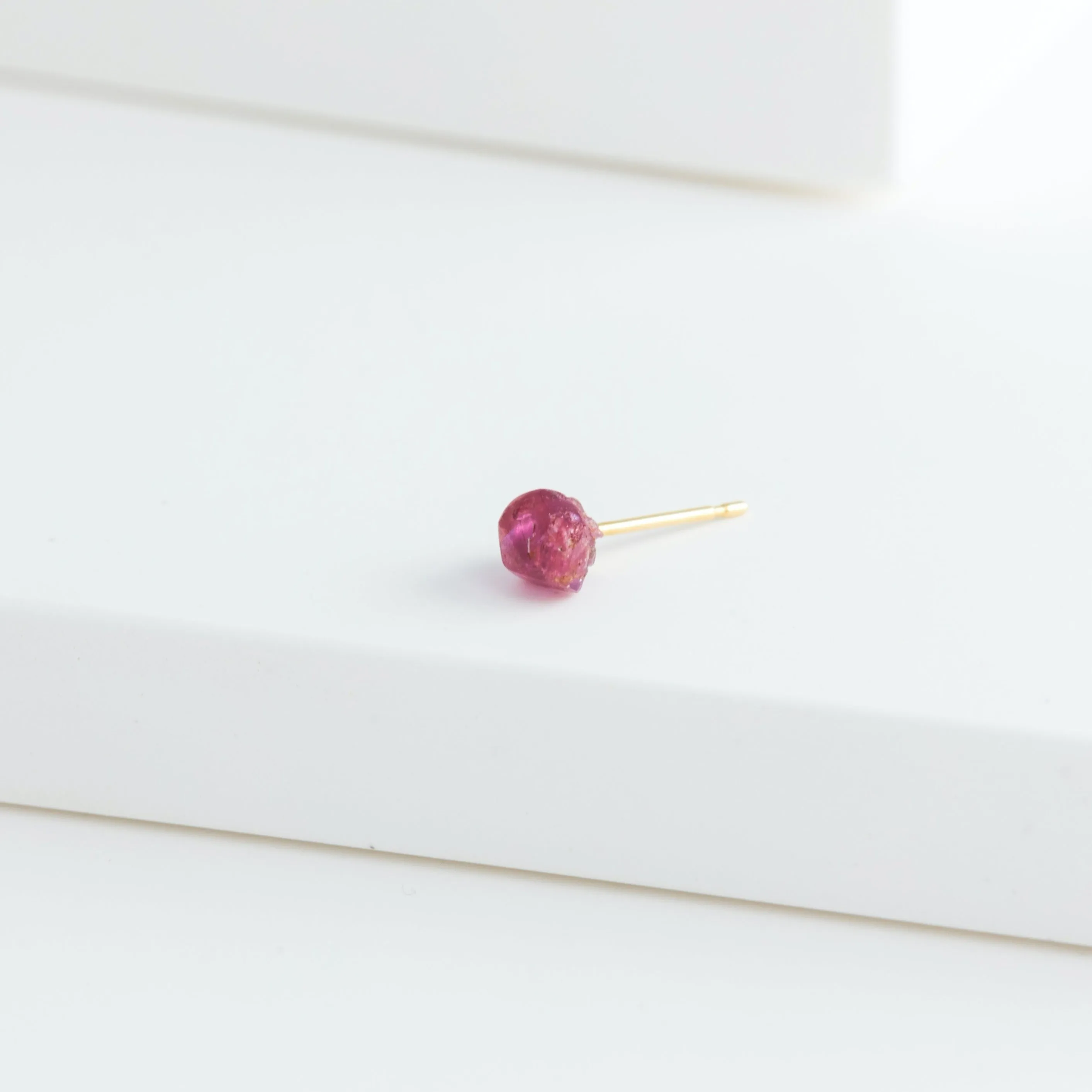 Rough stone ruby stud